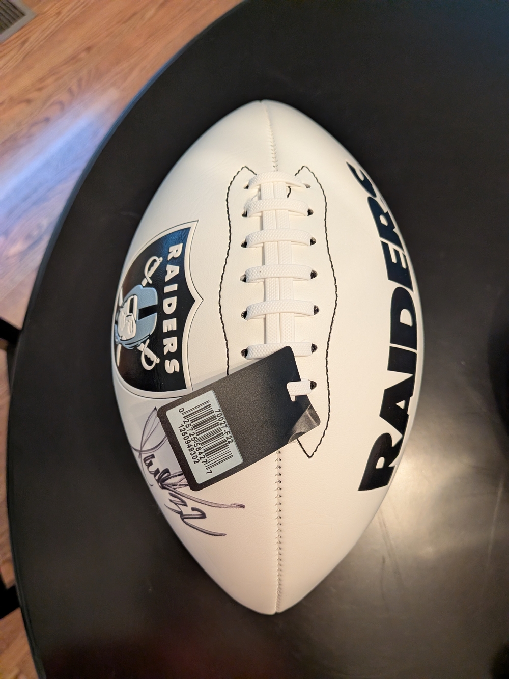 NWT Oakland Raiders Marcus Allen Autographed Football w/ plastic display stand.